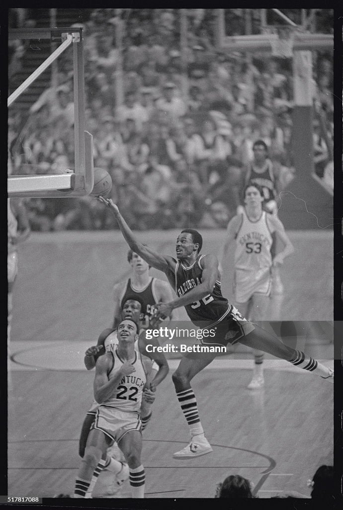 Sidney Moncrief with Basketball in Mid Air