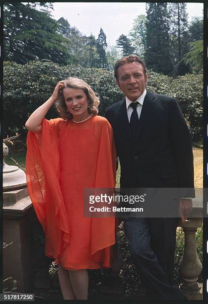 Richard Burton and French actress Marie Christine Barrault take a break from their chores at Pinewood Studios where they are currently filming The...