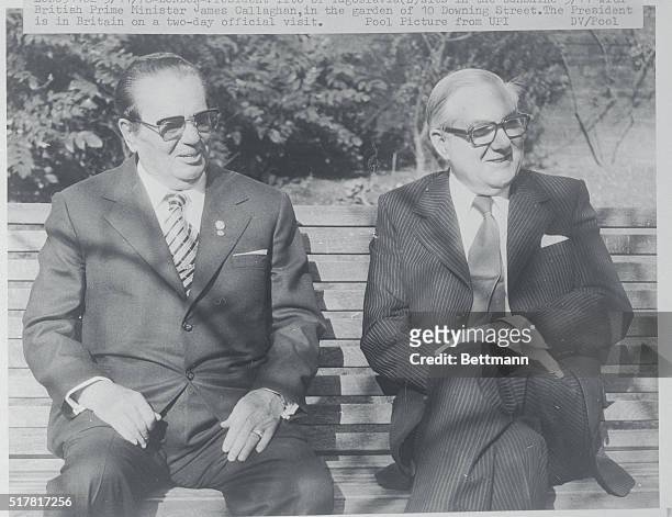 President Tito of Yugoslavia, , sits in the sunshine with British Prime Minister James Callaghan, in the garden of 10 Downing Street. The president...
