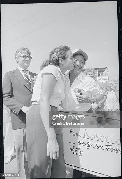 Mason, Ohio: Nancy Lopez gives her father, Domingo Lopez, a hug after she won the LPGA Championship 6/11. With a six stroke win over Amy Alcott, the...