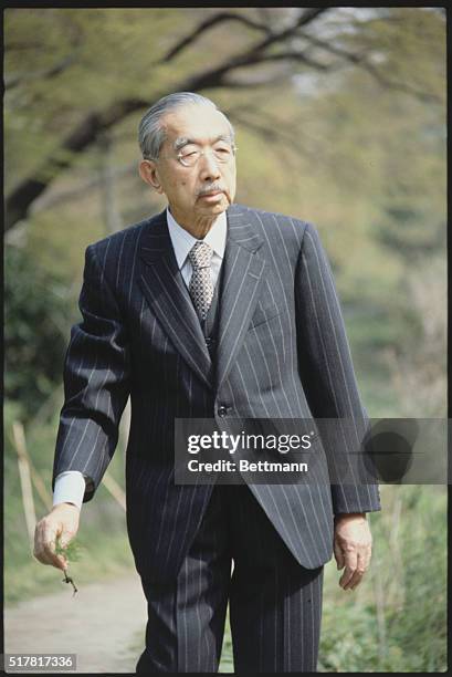 Tokyo, Japan: Japanese Emperor Hirohito strolling in the garden of the Imperial Palace. These were released for 77th birthday, April 29. April 1978.