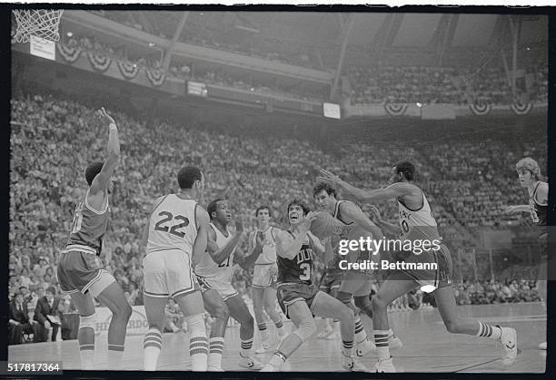 Duke University's Jim Spanarkel has no place to go as he is surrounded by Kentucky's Truman Clayton, Jack Givens, Kyle Macy, Mike Phillips and Fred...