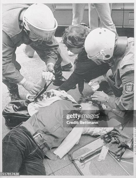 Frankfurt, Germany: AP-photographer Rolf Buhm was struck by a stone and severely injured August 13 when sympathizers of the right-wing National...