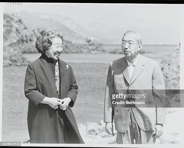 Tokyo, Japan: Emperor Hirohito, who celebrates his 76th birthday April 29 takes a walk with Empress Nagako at the Susaki Imperial Villa in southern...