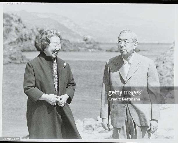 Tokyo, Japan: Emperor Hirohito, who celebrates his 76th birthday April 29 takes a walk with Empress Nagako at the Susaki Imperial Villa in southern...