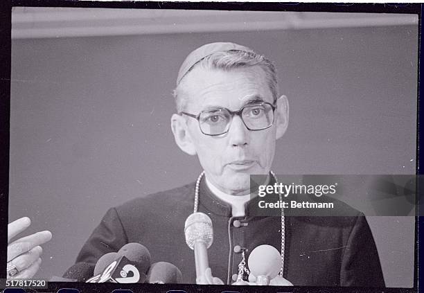 Cardinal Timothy Manning, of the Archdiocese of Los Angeles, gestures as he answers a question at a press conference to discuss the sudden death of...