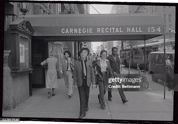 Quentin Crisp who in a sense has been a pioneer of sexuality, strikes a pose at the Carnegie Recital Hall. Crisp "came out" in the streets of London...