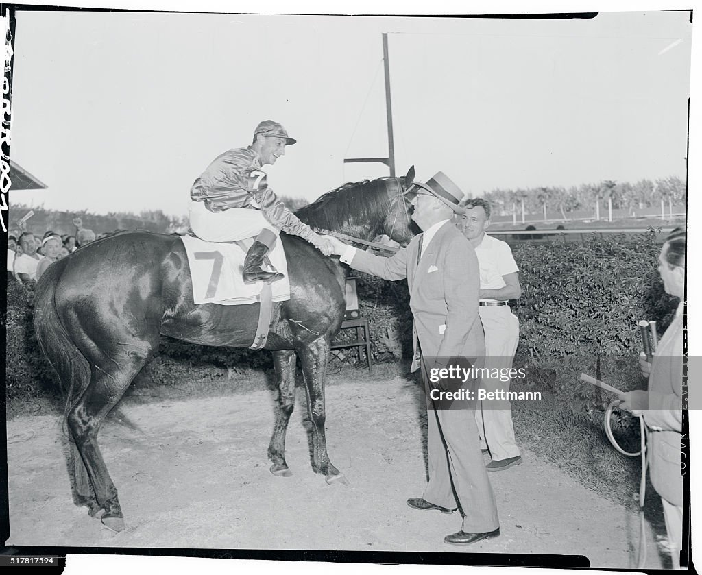 Eddie Arcaro Shaking Hands With Leslie Combs