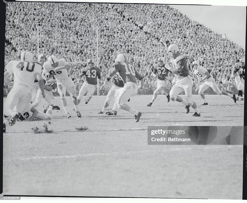 Tom McDonald Breaking Through a Defensive Line