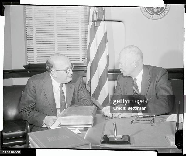 President Eisenhower is shown conferring with GOP National Chairman Leonard Hall, left, at the chief executive's Gettysburg office. After the meeting...
