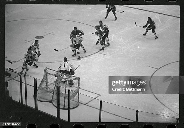 Chicago: Eric Nesterenko of the Chicago Black Hawks advances on N.H.L. All-Star goal under watchful eyes of All-Stars Doug Harvey , Montreal, Henry...