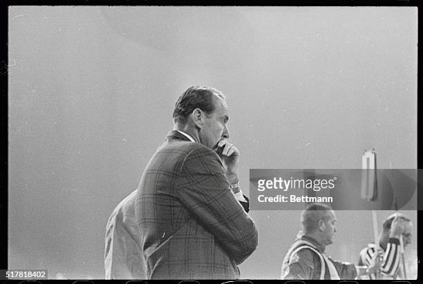Head coach Lou Rymkus wore a serious expression as he watches his team play against the Boston Patriouts. The Oilers and Patriots tied 31-31. Houston...