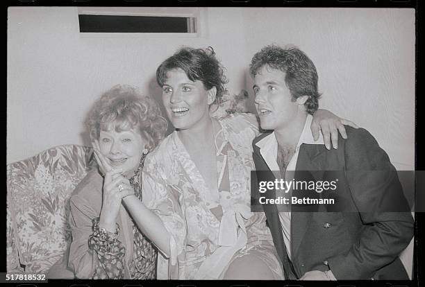 Lucie Arnaz is flanked by her mother, Lucille Ball and her brother, Desi Arnaz Jr., backstage at the Jones Beach Theater following her performance in...