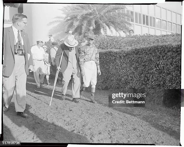 Wish I knew what happened." Jockey Eddie Arcaro tells trainer Sunny Jim Fitzsimmons, as they dejectedly leave the track after their horse, "Nashua,"...