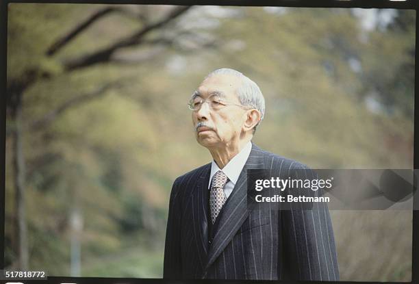 Tokyo, Japan: Japanese Emperor Hirohito strolling in the garden of the Imperial Palace. These were released for 77th birthday, April 29. April 1978.