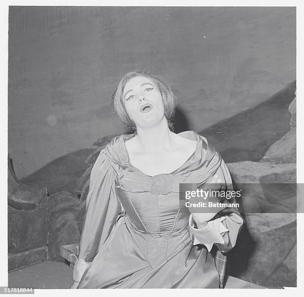 Rehearses For Met Debut. New York: Australian soprano Joan Sutherland sings during rehearsal of Donizetti's Lucia di Lammermoon at the Metropolitan...