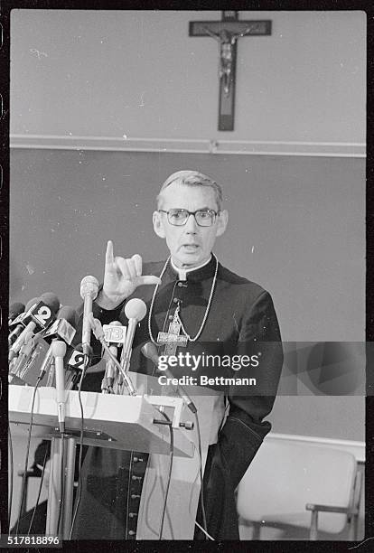 Cardinal Timothy Manning, of the Archdiocese of Los Angeles, gestures as he answers a question at a press conference to discuss the sudden death of...