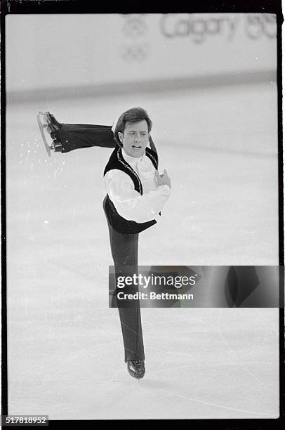 American figure skater Brian Boitano kicks uses his leg here, as he performs during the men's short program in the Stampede Corral arena at the XV...