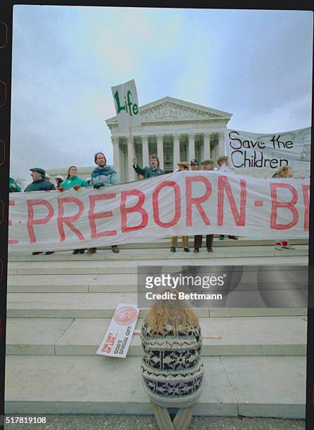 Washington: A woman takes part in a "pray-in" on the step's of the Supreme Court during the March for Life demonstration. More than 50,000 people...