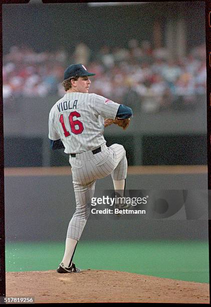 Cincinnati, Ohio: Mets' Dwight Gooden pitches at left, Twins' Frank Viola at right in All-Star game, July 12. Gooden gave up a home run in his three...