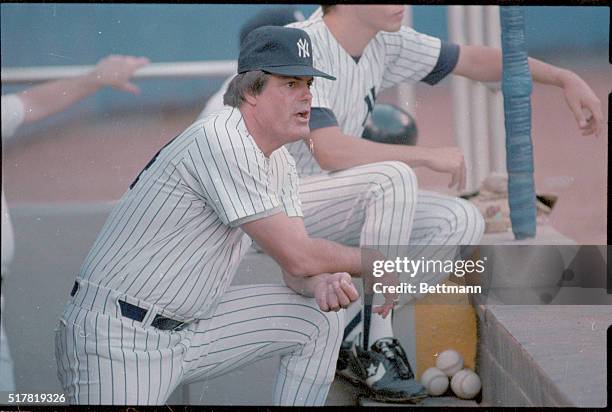 New York: Back in the dugout as manager, Lou Piniella checks out the field for the start of a four game series with the Cleveland Indians after Billy...