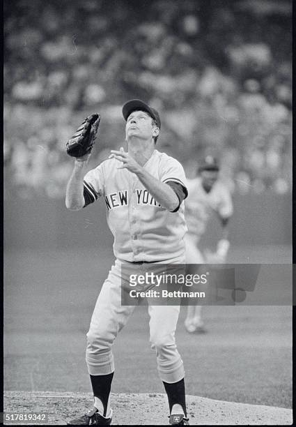 Detroit: New York Yankees pitcher Tommy John watches a ball go foul in the 3rd inning of the Detroit-New York game. John at 45 years of age is the...