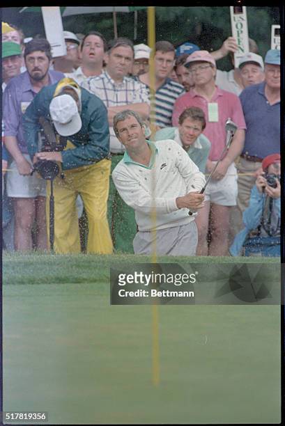Curtis Strange blasts out of a trpa onthe 16th hole, 3rd round, of the US Open. PH: Stuart Cahill