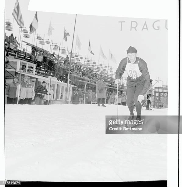 Sverre Stenersen, of Norway, poles along the Olympic track at Cortina in the 15-kilometer cross-country race, the second half of the Olympic Nordic...
