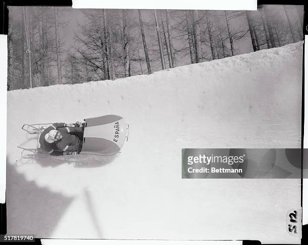 The Spanish team of Marquis de Portag and Vincente Cabeza de Veca zooms down the speedy bob slide, during the last heat of the finals of the two-man...