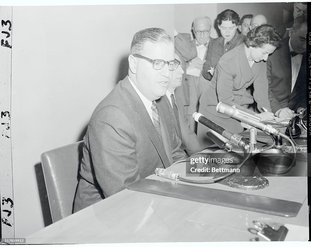 Abba Eban Sitting Behind Microphones