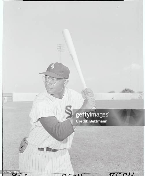 Larry Doby, who came from the Cleveland Indians to the Chicago White Sox, is shown at bat at the Sox spring training camp in Tampa. Larry wears...