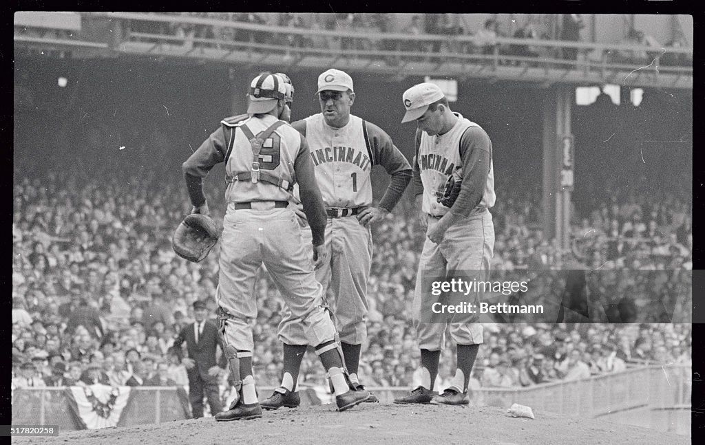 Hutchinson Confers with O'Toole and Johnson During World Series Game