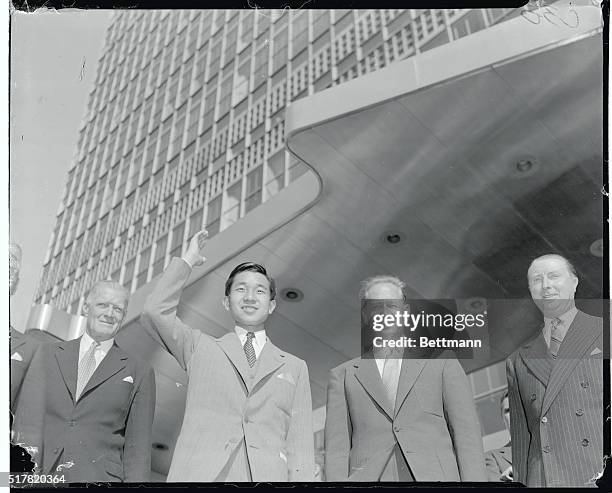 Prince Akihito Visits World Organization, United Nations. New York, New York: With the United Nations building as a towering background, Crown Prince...