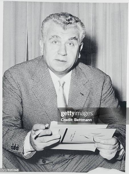 Gino Cervi, veteran of sixty Italian films and Italy's most famous screen actor, in London, at the Savoy Hotel, for the premiere of his latest film...