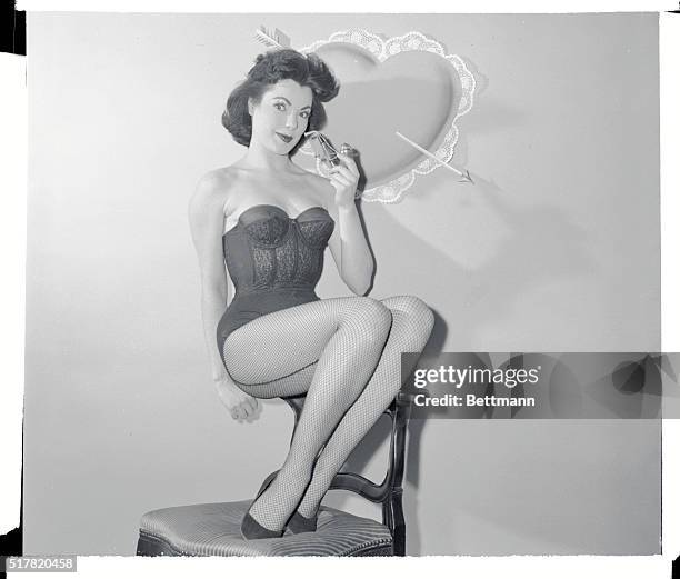 This valentine picture in a bow by young Judy Tyler to those who helped make her Pipe Dream of success a reality. Judy, ingenue lead in the current...