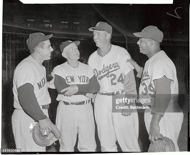 World Series foes meet in gladness before today's exhibition game between the Yankees and Dodgers. Both league's MVPs flank the teams' managers. From...