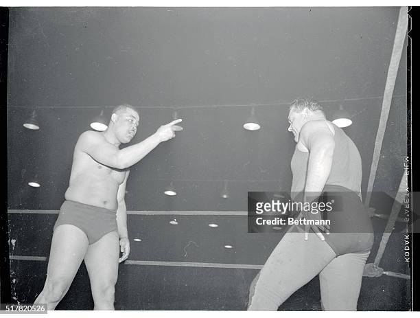 Joe Louis warns Don "Cowboy Rocky" Lee not to punch as the ex heavyweight champ made his debut here as a pro wrestler. The end came at 11 minutes of...