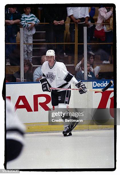 Wayne Gretzky making his first appearance in a Los Angeles Kings uniform warms up for the season opener in Los Angeles.