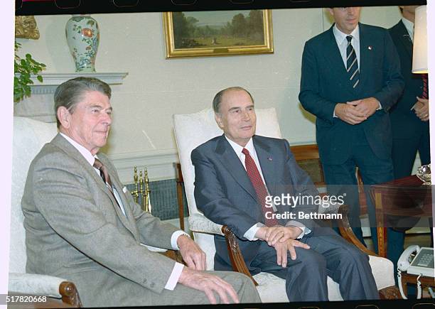 Washington: President Reagan meets with French President Francois Mitterrand in the Oval Office.