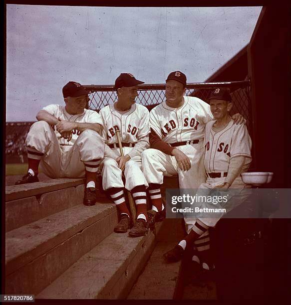 Boston Red Sox-Board of Strategy. Left to right: Larry Woodall, Del Baker, manager Joe Cronin and Tom Daley in Red Sox Dugout.