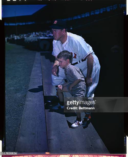 Manager Joe Cronin of the Boston Red Sox is shown here with his three year old son Michael "Corky" Cronin.