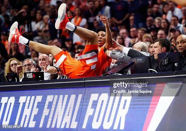 Malachi Richardson of the Syracuse Orange falls off of the court in the second half against the Virginia Cavaliers during the 2016 NCAA Men's...