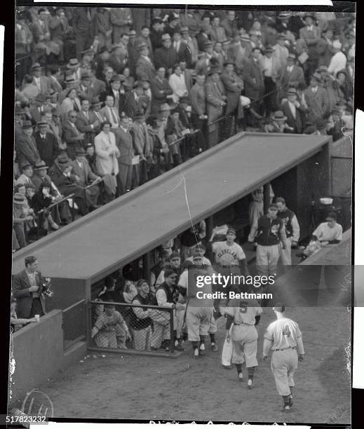 Keltner congratulated by players after hitting a 3 run homer during a Boston Red Sox vs Cleveland Indians playoff game.