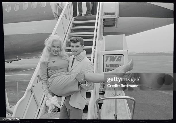 Blonde actress Mamie Von Doren and her 21 year old boyfriend, Anthony, Santoro of Hollywood, are shown at the International Airport before Mamie...