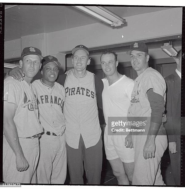 Vern Law, of the Pittsburgh Pirates, National League starting pitcher in the second All Star game is shown here on July 13th. He is surrounded by the...