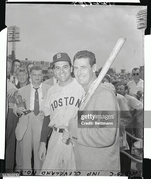 Captain Ted Williams, former Boston Red Sox slugger, who until recently had been flying jets against the Reds in Korea, is shown , as he posed...