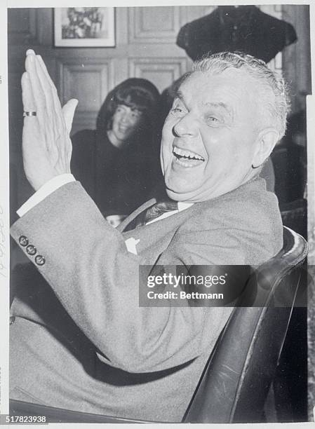 Ottawa, Ont.: Opposition Leader John Diefenbaker enjoys a laugh at an impromptu birthday party, given to him by members of his staff. Mr. Diefenbaker...