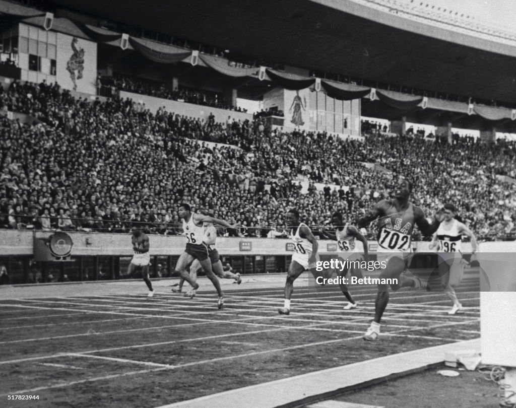 Bob Hayes Breaking the Tape of Olympic 100 Meter Dash