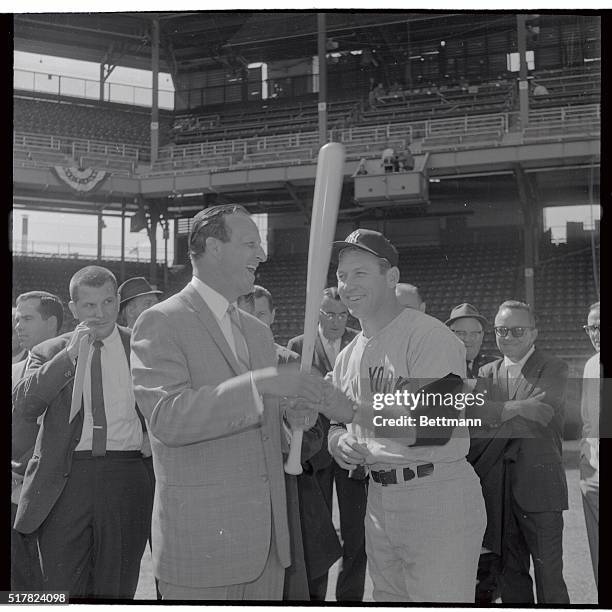 New York Yankees slugger Mickey Mantle , and former St. Louis Cardinals great, Stan Musial, renew acquaintances here during workout for the World...