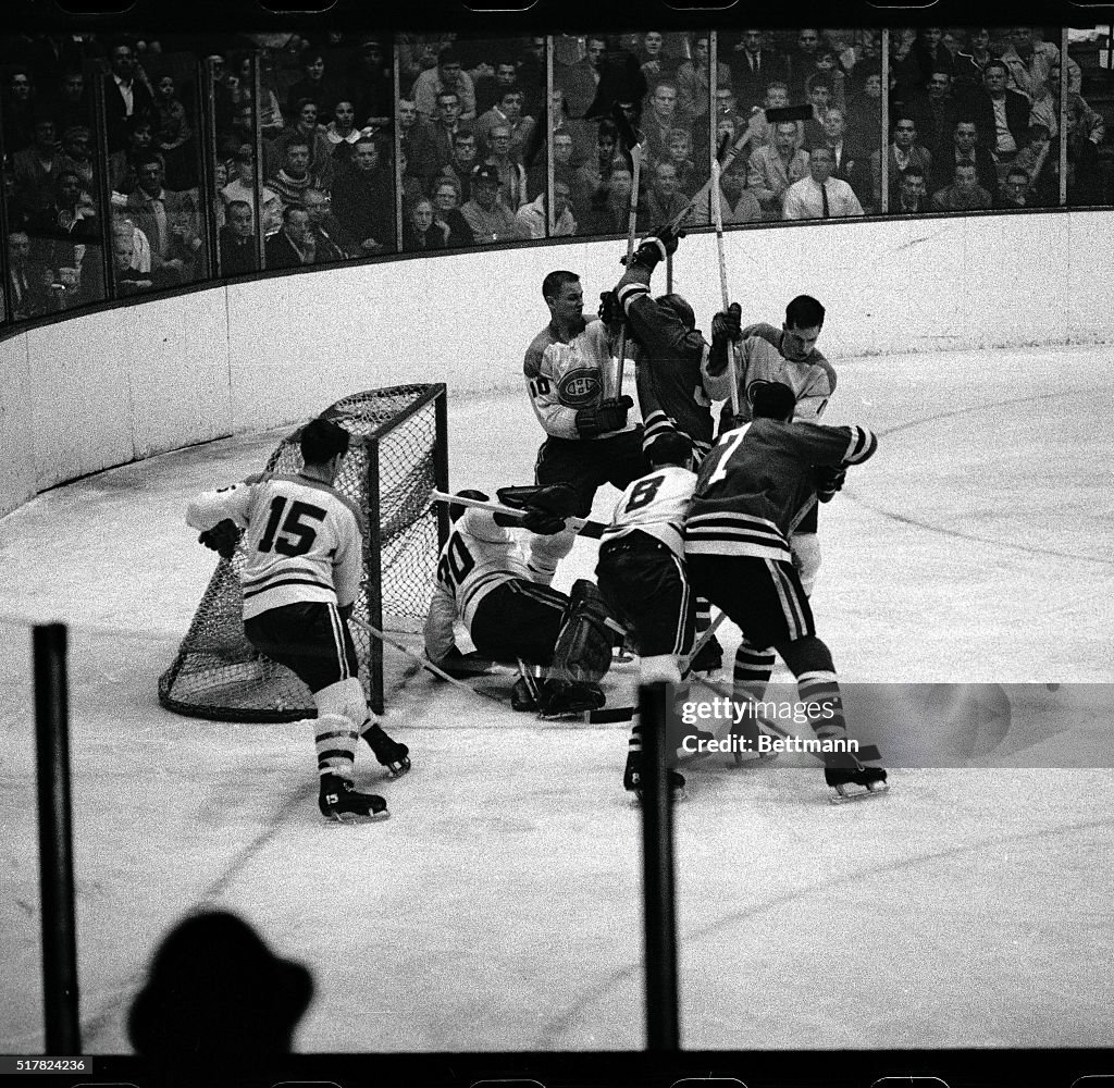 Bobby Hull Battling in Hockey Action